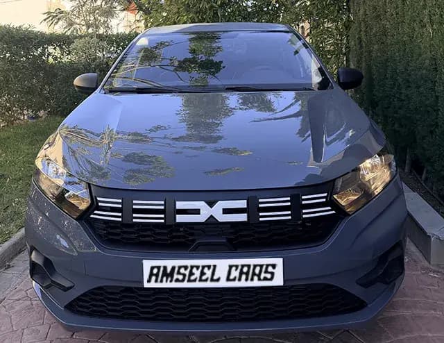 Dacia Logan location voiture Agadir (citadine) | Dacia Logan 2026 diesel manuelle : berline spacieuse, économique et fiable. Idéal… Dacia Logan 2026 (citadine), vue avant · Agadir, Maroc · AmseelCars