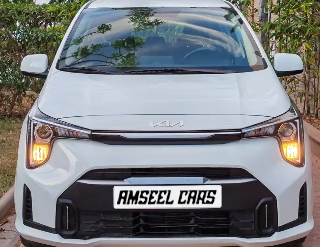 Kia Picanto location voiture Agadir (SUV) | SUV familial moderne, le Kia Picanto 1.0 GDI 66 ch avec boîte automatique DCT à 7… Kia Kia Picanto 2025 (SUV), vue avant · Agadir, Maroc · AmseelCars